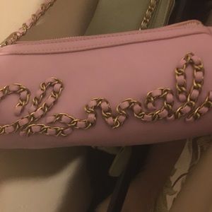 Lilac vegan leather duffle cross body chain details